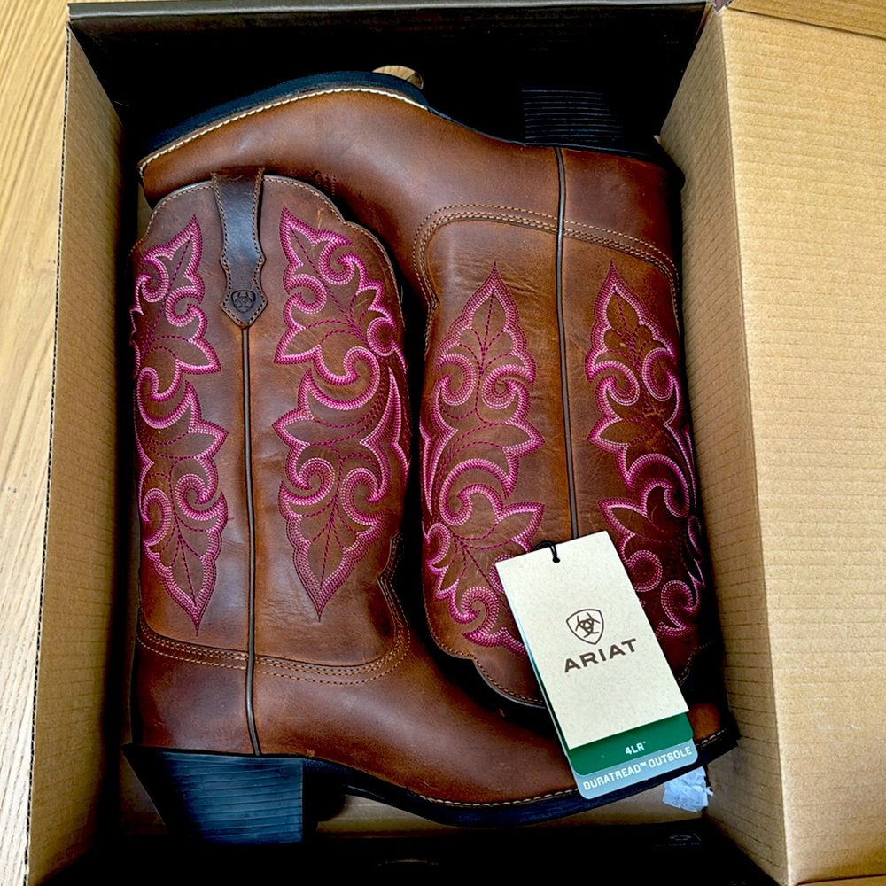 Never worn Ariat boots. Size 10.  Horse riding boots